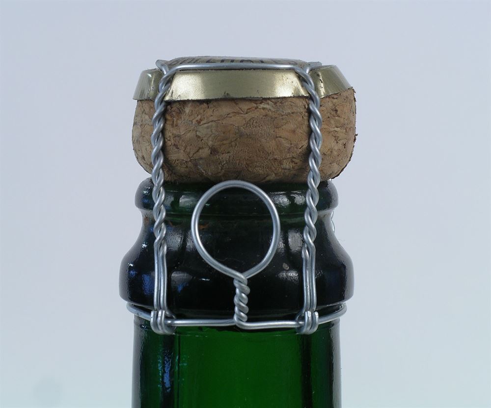 Shown corked with wire muzzle (available separately) applied
